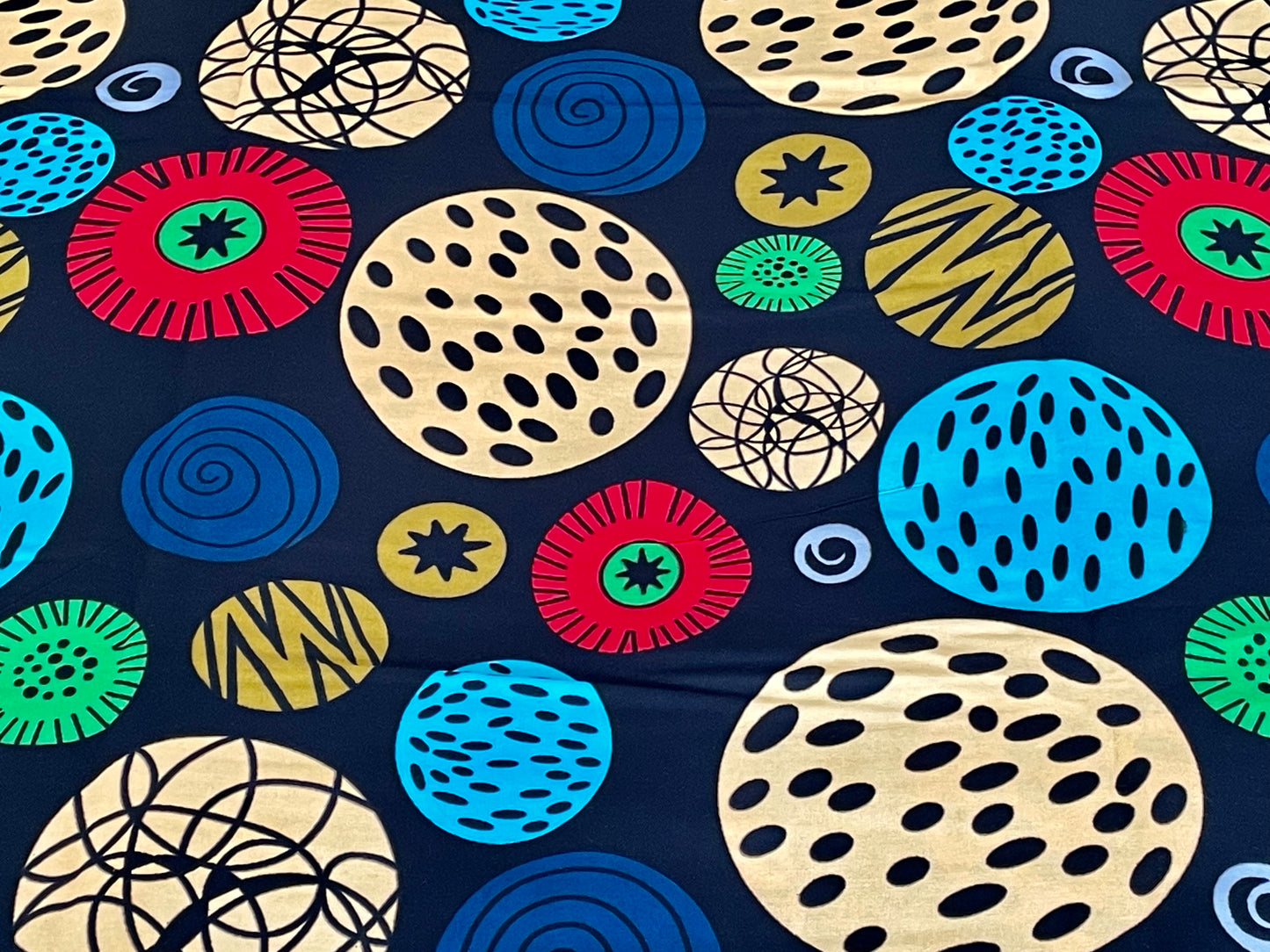 Masara - African Ankara Kitenge Cotton Dressmaking Crafter Fabric Sold by the Yard Multicolored Red/Black/Orange Circle Patterned Fabric