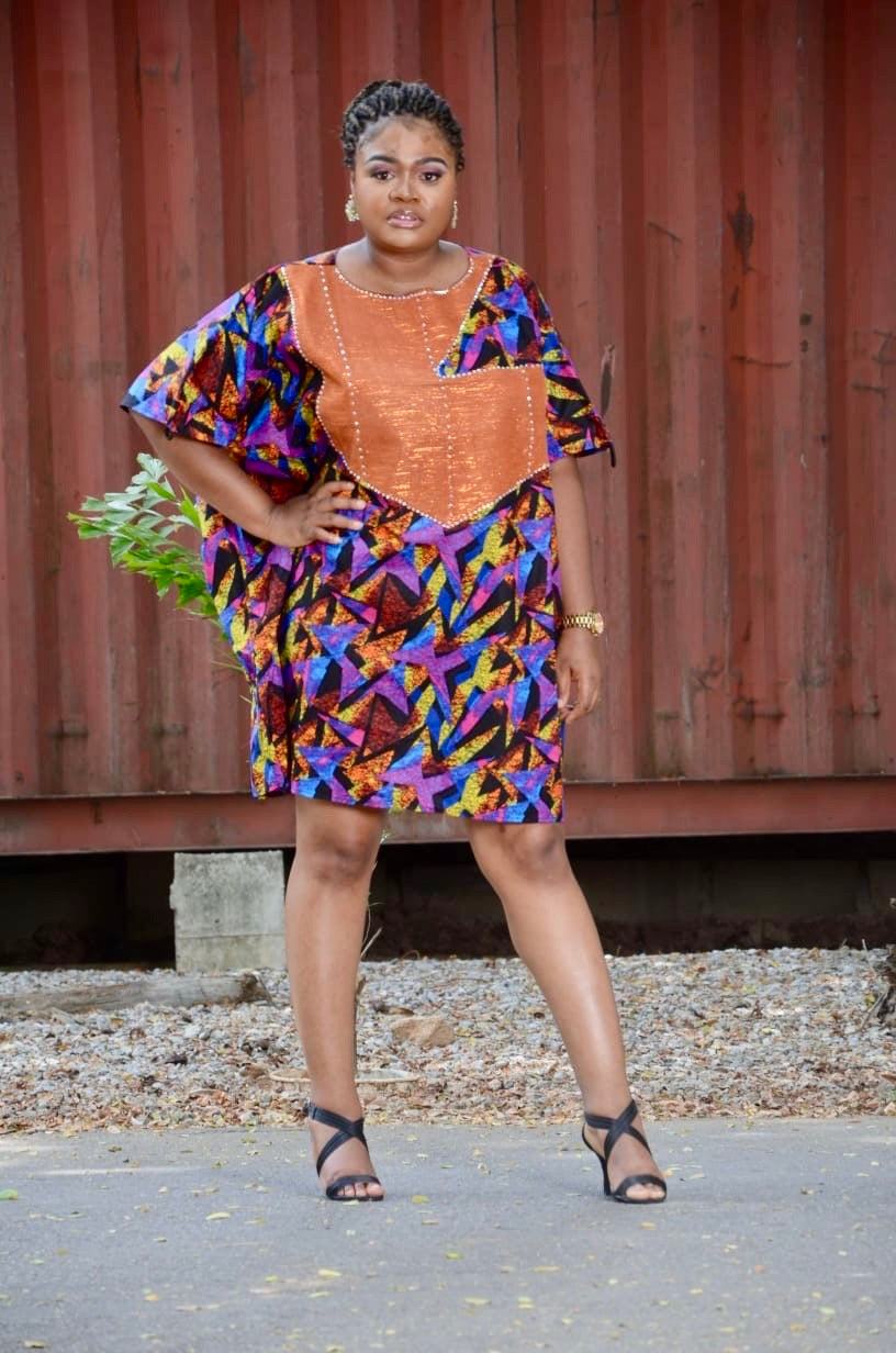 Multicoloured African Wax Tunic with Aso Oke embellishment in front, coupled with adjustable strings at shoulders and side seams